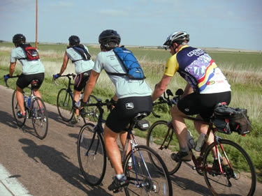 The pastor from Trinity Lutheran Church in Arapahoe, NE 
(far right) biked with us 40 miles to McCook.