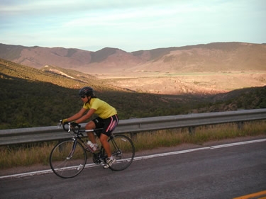 Dawn bikes through a gorgeous canyon on the
way into McCoy, CO.