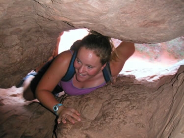 Kelly crawls through an arch called, conveniently,
Crawl-Through Arch.