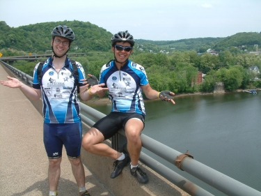 Sam and Weijie enjoying life on top of a bridge with a gorgeous view