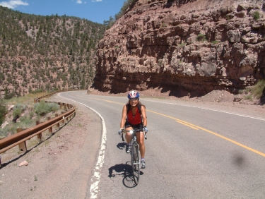 Climbing the mountains can be hard, but Trang does it with a smile (only on the uphills though).