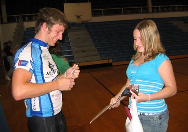 the kids were so impressed that they asked him to sign their yearbooks