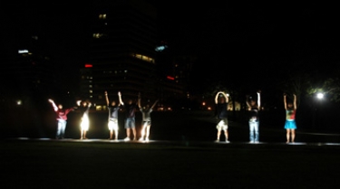 The Arch at nighttime.  We look like something out of the Rent opener.