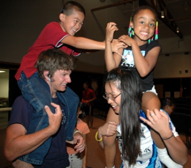 Playing with the pastor's kids at the Garden City First Baptist Church.