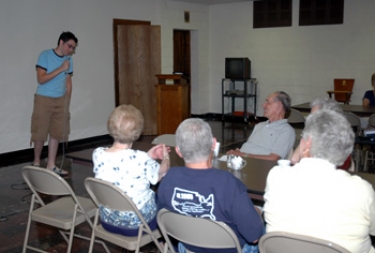 Ersin introducing himself to the members of the Fairbury Grace Lutheran Church.