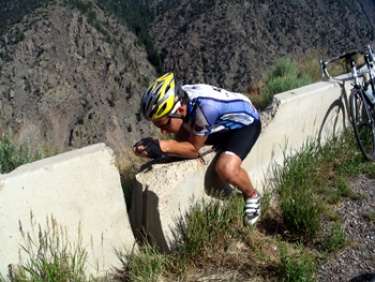 chris found some aero bars on the concrete barrier. his bike also turned into a block of cement.