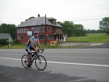 Tom rides back up a massive hill to rejoin his group... trooper.