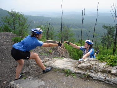 Kara lends Michelle a helping hand.