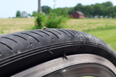 the rusty nail that went right through Becca's tire!