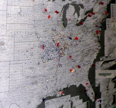 A map with pushpins marking the hometowns of residents seeking outpatient care while living at the American Cancer Society's Hope Lodges (red flags).