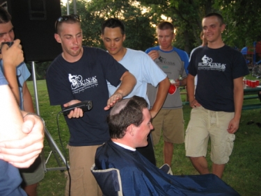 Rob outdoes everyone with the Friar Tuck 'do.