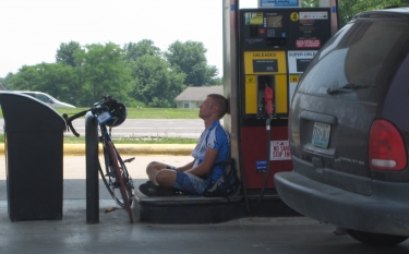 Eric takes a break at a gas station.