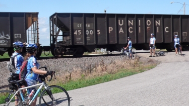 Sarah, Katherine, Dewey, Logan and Nicole wait for the train to pass on our way to Frankfort, KS.