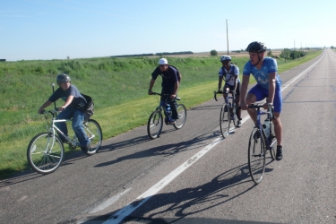 Caleb, Aaron, Shantha and Dewey, riding out of Benkelman.