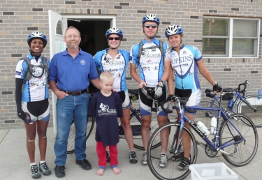 Pastor Dean and his grandson William with Shantha, Michelle, Jerome and Allie outside Summit Baptist Church in Wiggins, CO.